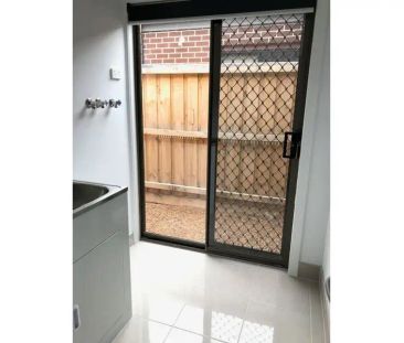 “4 BEDROOM HOME WITH 2 LIVING SPACES!” - Photo 4