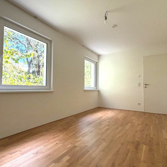 Hochwerige, sonnige und freundliche 3 - Zimmer Neubauwohnung – mit Balkon und Gartenmitbenützung! - Photo 1