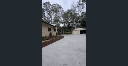 Spacious 4-Bedroom Acreage Retreat with Ultimate Privacy - Photo 2