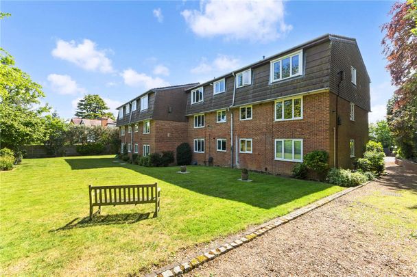 A bright and centrally located, two bedroom second floor apartment with off street parking - Photo 1