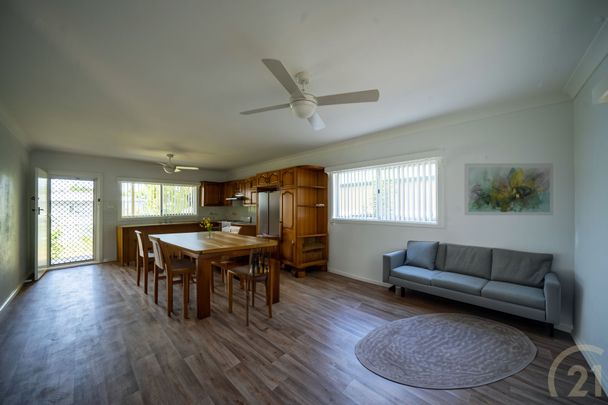 Rare Find! Solid Double Brick Two-Storey 4-Bedroom Family Home with Balcony Views - Photo 1