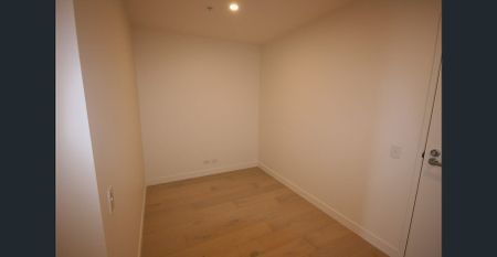 Nearly New Two Bedroom Apartment with Study - Photo 5