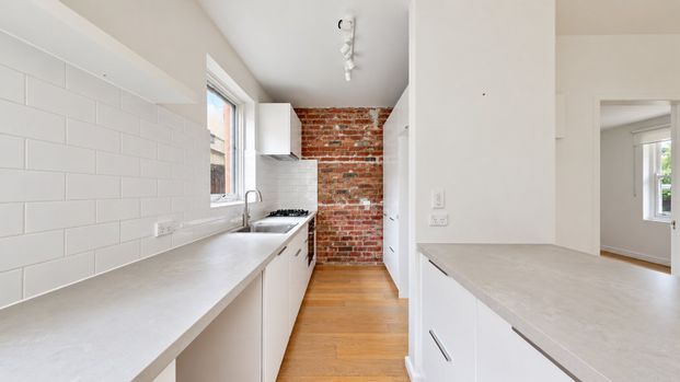 Sunlit Style, Undercover Parking & Walkable Hawthorn Living - Photo 1