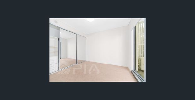 Modern 2 bedroom apartment close to amenities for lease - Photo 1