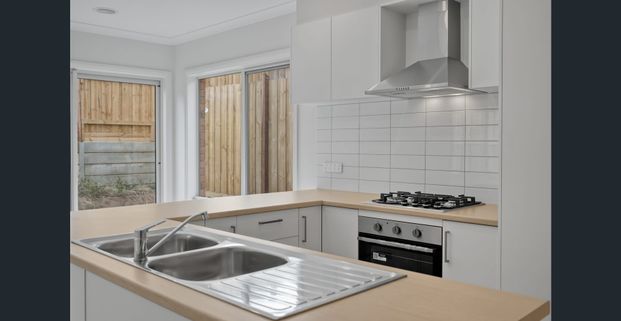 Light Filled 4-Bedroom Home - Photo 1