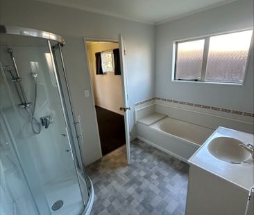 Tucked away in Forest Lake, this charming three-bedroom home awaits... - Photo 1