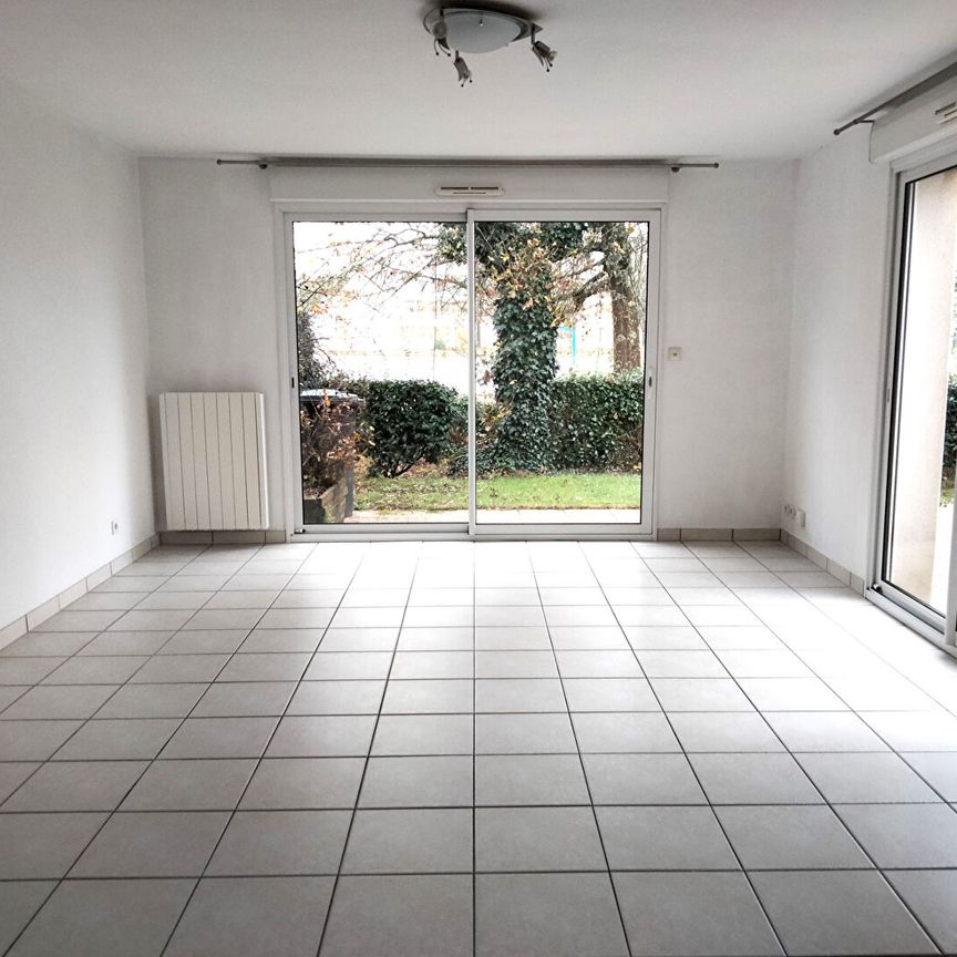 Appartement VANNES/SENE 4 pièces 82 m² avec jardinet - Photo 1