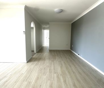 FULLY RENOVATED FLOOR 2 BEDROOM UNIT 500M TO AUBURN STATION - Photo 1