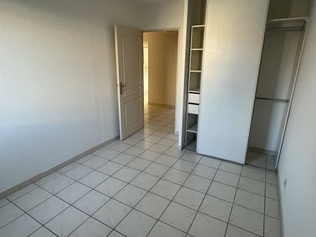 Location Appartement 3 pièces 64m² NIMES 30000 - Photo 4