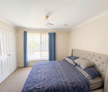 Spacious Family Home in a Prime Glenmore Park Location - Photo 1