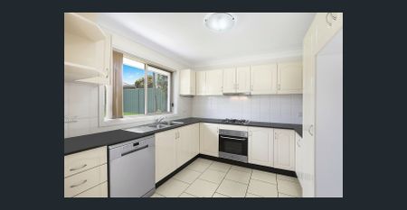 Modern Comfort Meets Low Maintenance Lifestyle - Photo 3