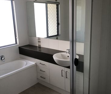 Fully fenced low maintenance yard - Photo 6