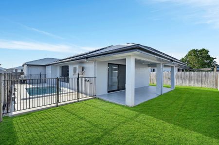 Modern Family Home with Pool in Prime Mount Low Location - Photo 3