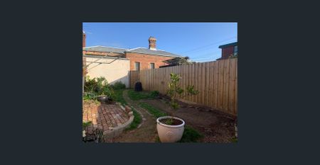 Charming Two Bedroom Victorian Home in the Heart of Brunswick! - Photo 4