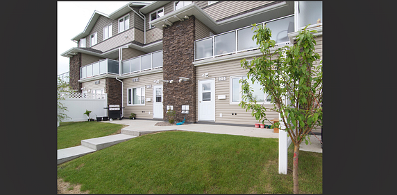 2 Bedroom Walk-out Townhouse in Hampton Village - Photo 2