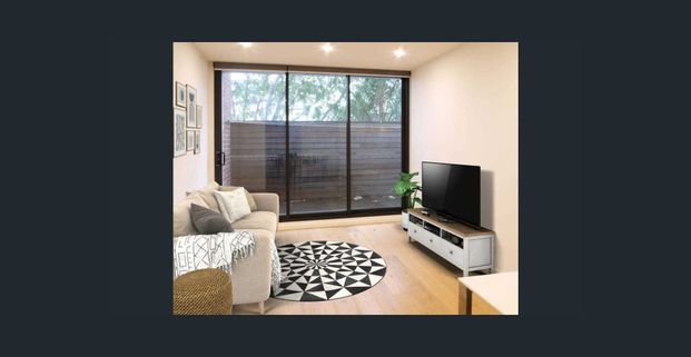 Stunning Brunswick Apartment with Treed Outlook & Unbeatable Convenience - Photo 1