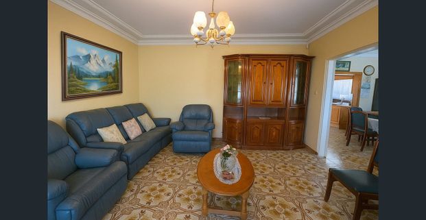 BEAUTIFUL DOUBLE BRICK ITALIAN STYLE HOME + SLEEP-OUT - Photo 1