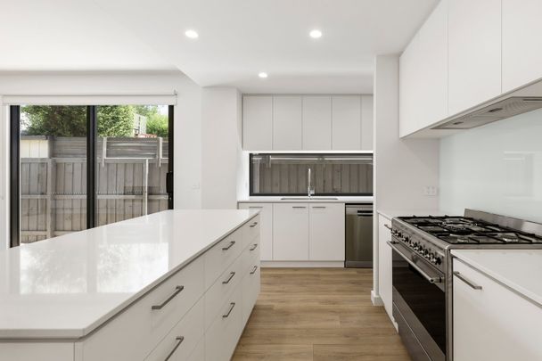 STUNNING BRAND NEW FOUR BEDROOM TOWNHOUSE - Photo 1