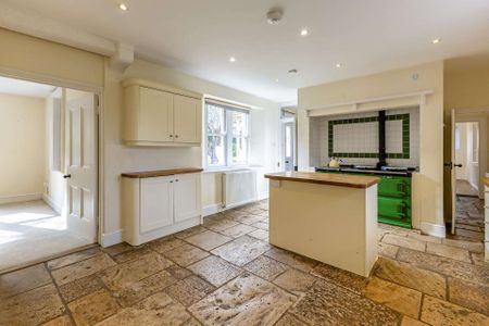An attractive traditional stone built Grade II listed farmhouse set in enclosed grounds, in the village of Stanton Harcourt. - Photo 3