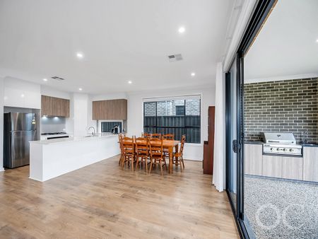 Open the Door to Sun-Soaked Living in a Premium Woodville West Pocket - Photo 3