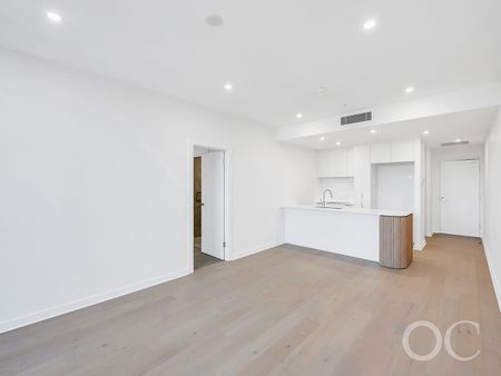 Open the Door To Designer Living with Elevated East Rundle Views - Photo 5