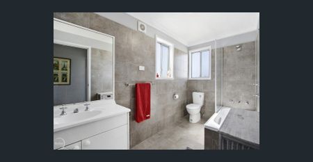 A COSY FOUR BEDROOM NEST - Photo 3