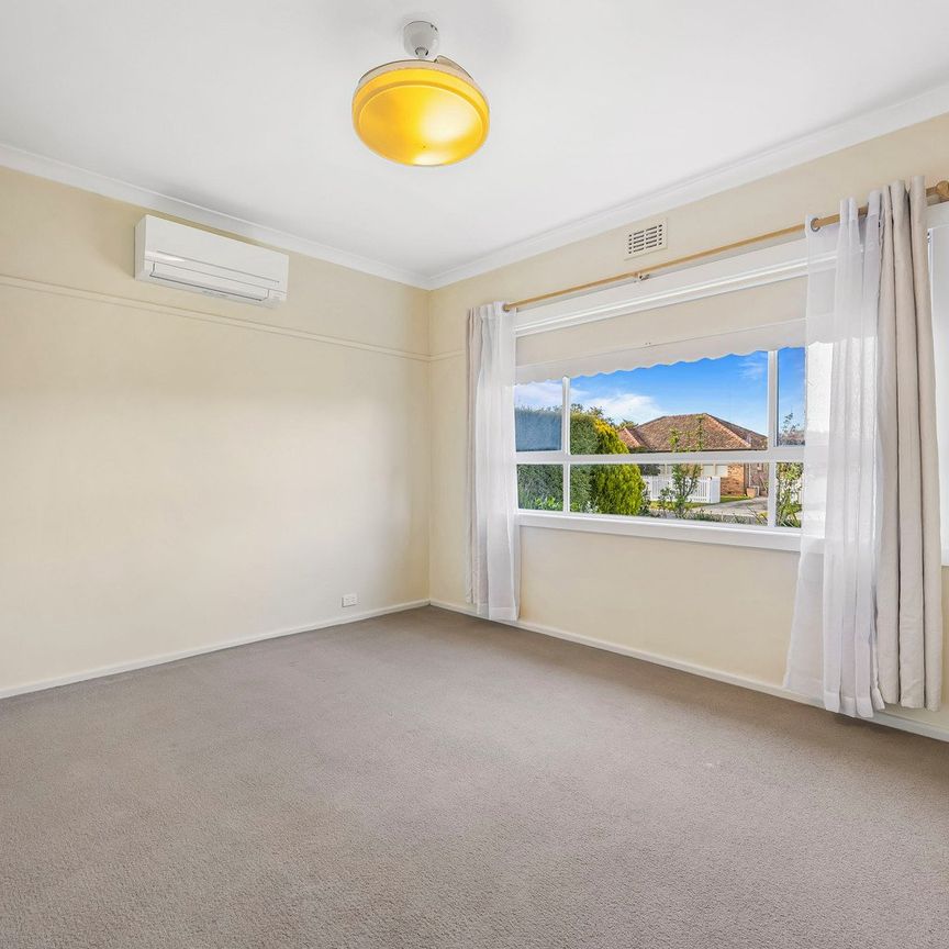 Neat as a Pin in Prime Alfredton Location - Photo 1