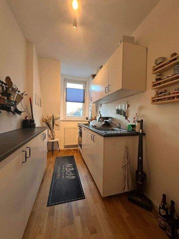 Gemütlich unter dem Dach: 2-Zimmer-Wohnung mit Holzbalken-Charme - Foto 5