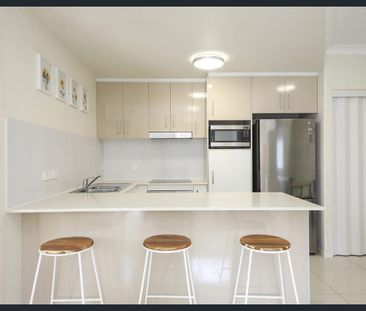 MAKE THIS STLISH AND COMFORTABLE 2-BEDROOM HOME YOUR OWN - Photo 5