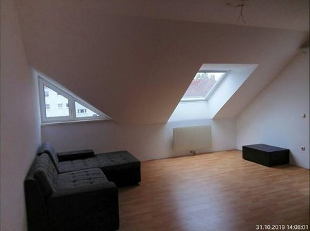 Helle 2 Zimmer Dachgeschosswohnung mit Loggia und zugehörigen Stellplatz - Foto 4