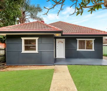 Delightful Family Home in Sought-after Location - Photo 3