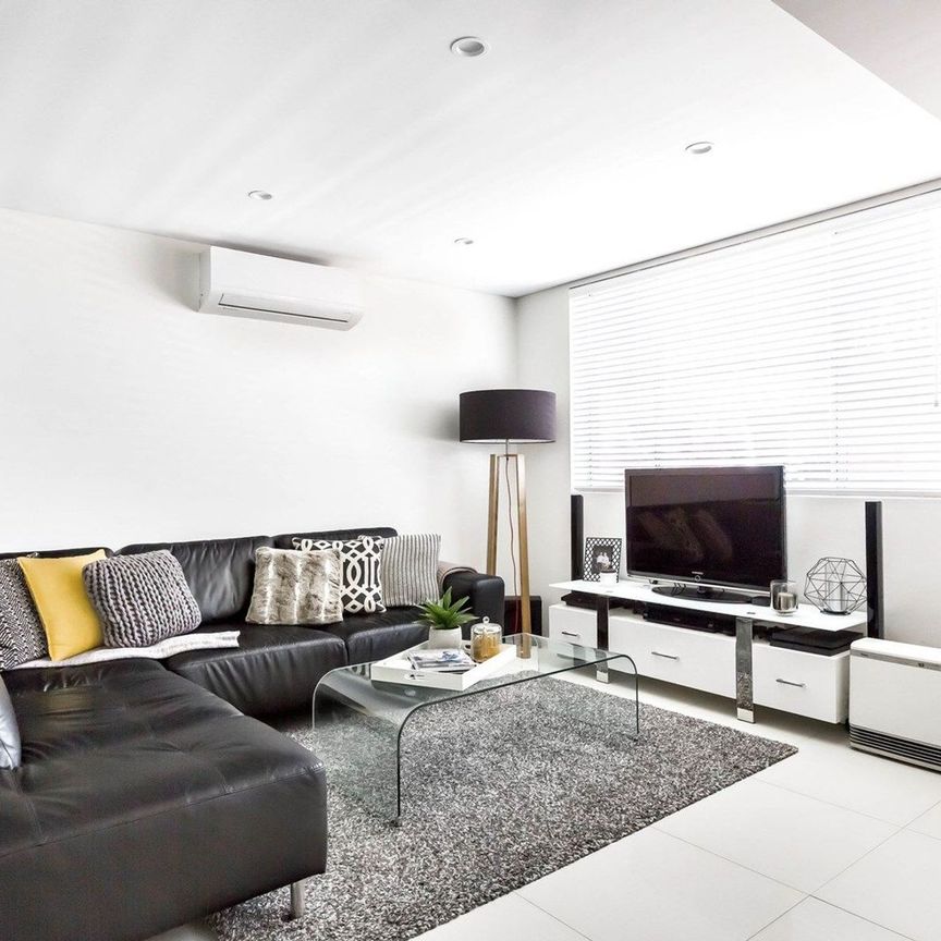 Totally Renovated Two Bedroom Apartment with Garage - Photo 1