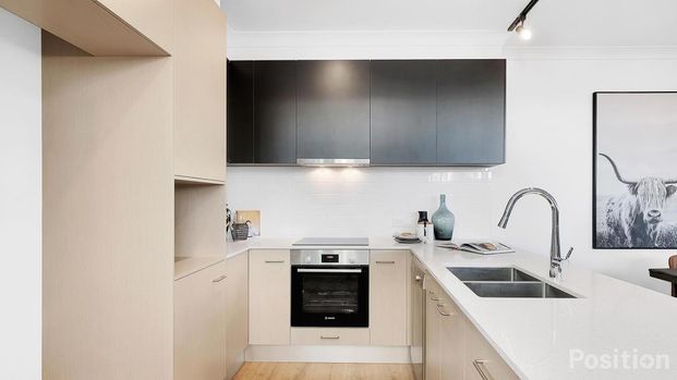 Spacious 4-Bedroom Townhouse in a Quiet Complex! - Photo 1