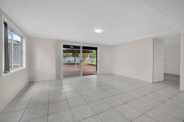 A charming home set on a generous block with a sprawling backyard. - Photo 1