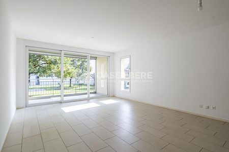 ELEGANT 3.5-ROOM APARTMENT IN BELLINZONA WITH GARDEN - Photo 3