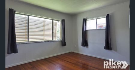 High-Set Home with Large Backyard - Photo 3