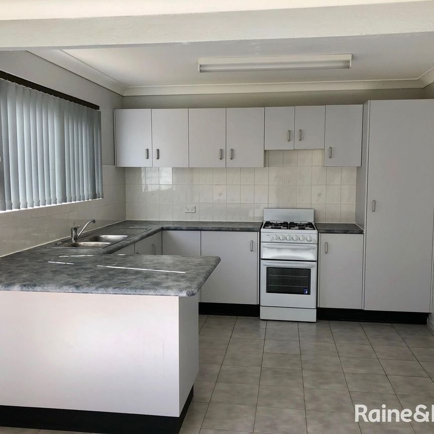 Spotless Townhouse in Boutique Security Gated Development - Photo 1