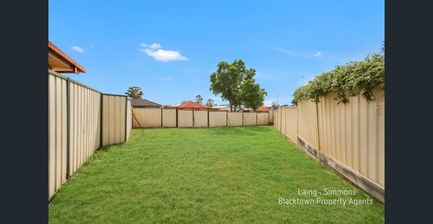 MODERN RENOVATED THREE BEDROOM HOME! - Photo 1