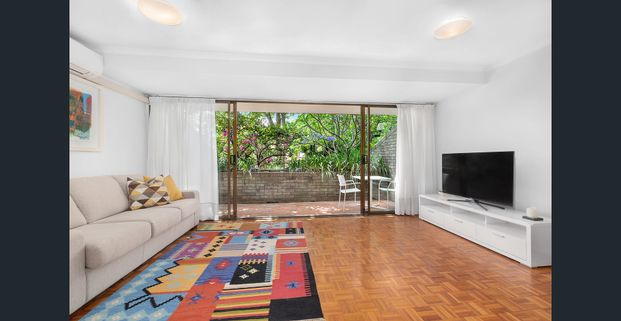 BEAUTIFUL GARDEN APARTMENT OFFERING PRIVACY AND CONVENIENCE IN PEACEFUL LOCALE - Photo 1