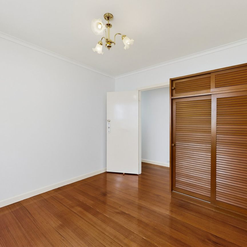Versatile Three Bedroom Home with Multiple Living Zones - Photo 1