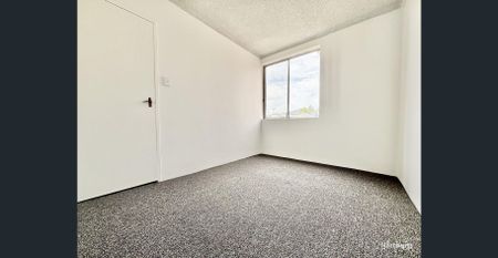 Neat & Tidy First-Floor Two Bedroom Unit... - Photo 2