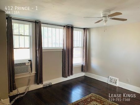 LARGE AND FURNISHED MAIN FLOOR UNIT- ALL INCLUSIVE + INTERNET! - Photo 2