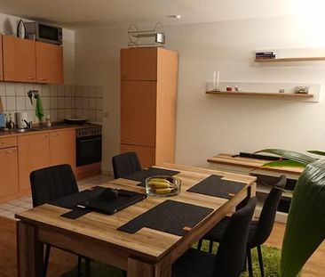 Helle Wohnung mit Einbauküche und Tageslichtbad - Foto 1