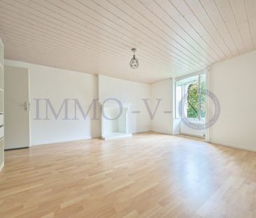 SPACIOUS TRI-LEVEL WITH CHARM AND BALCONY-TERRACE - Photo 1