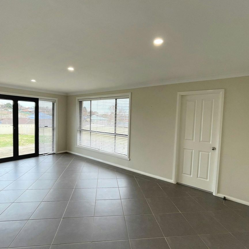 FAMILY HOME WITH LOW MAINTENANCE YARD! - Photo 1