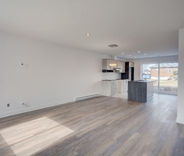 Superbe 5 ½ sur deux étages, style maison de ville! - Photo 4