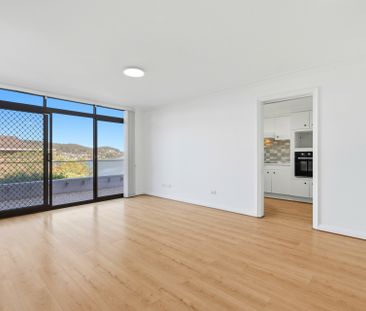 Recently Renovated Three-Bedroom Unit - Photo 6