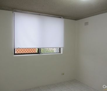 Spacious Second Floor Unit - Photo 4