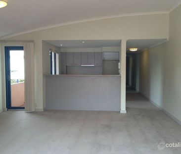 Top Floor Two-Bedroom Apartment With Parking - Photo 1