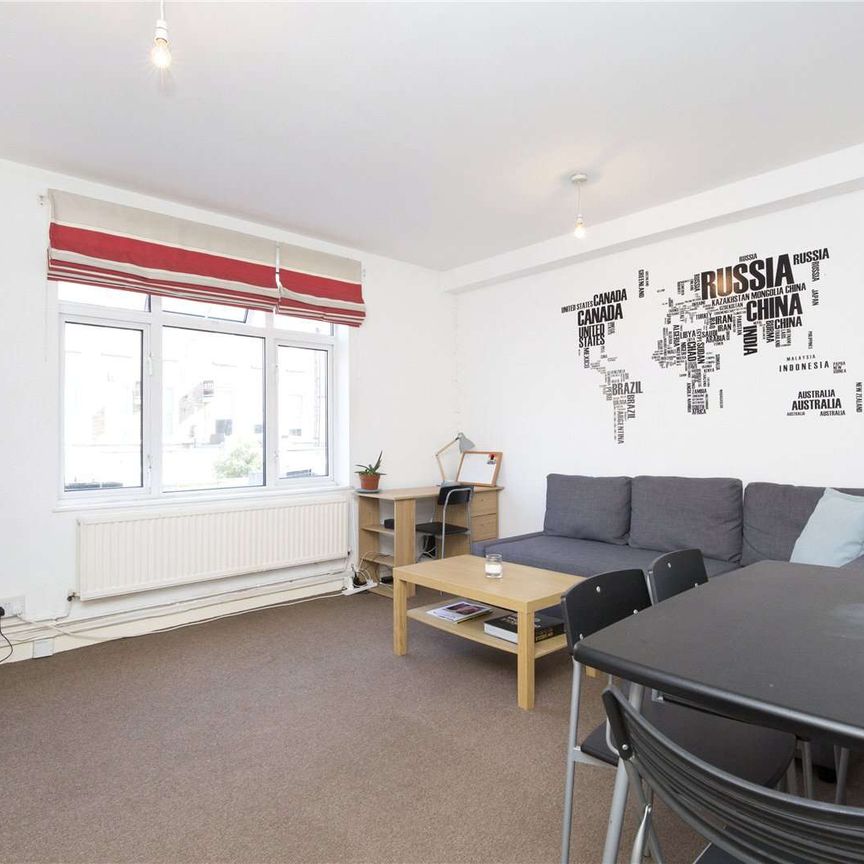 A centrally located 1 bedroom first floor apartment. Chapel Market is a lively central Islington street market with many interesting and exotic stalls. - Photo 1